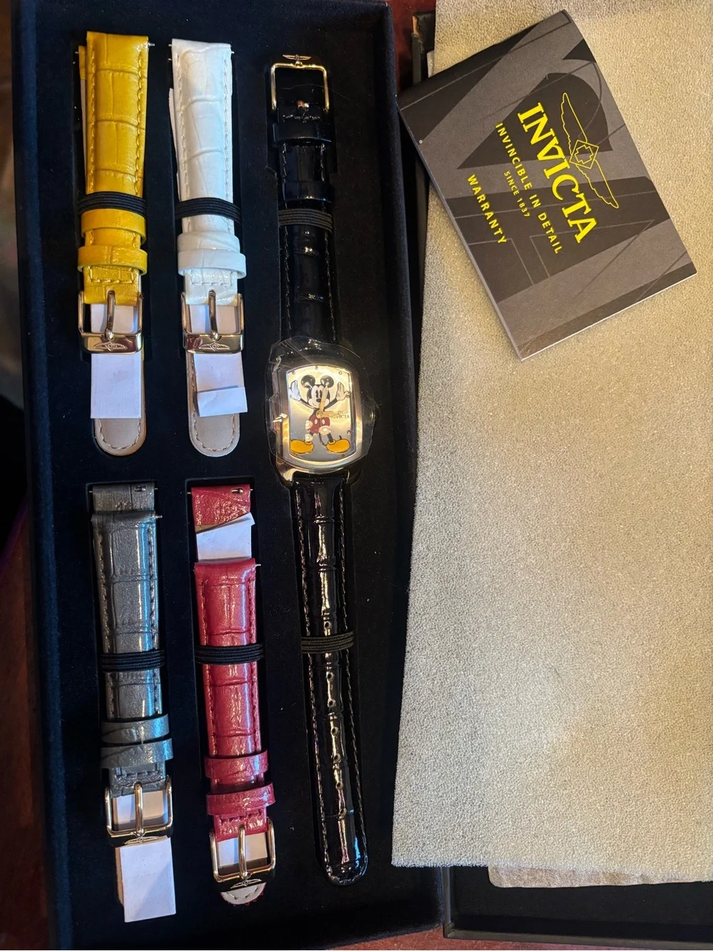 Invicta Men’s Black Watch with Interchangeable Yellow, White, Red, Gray Straps